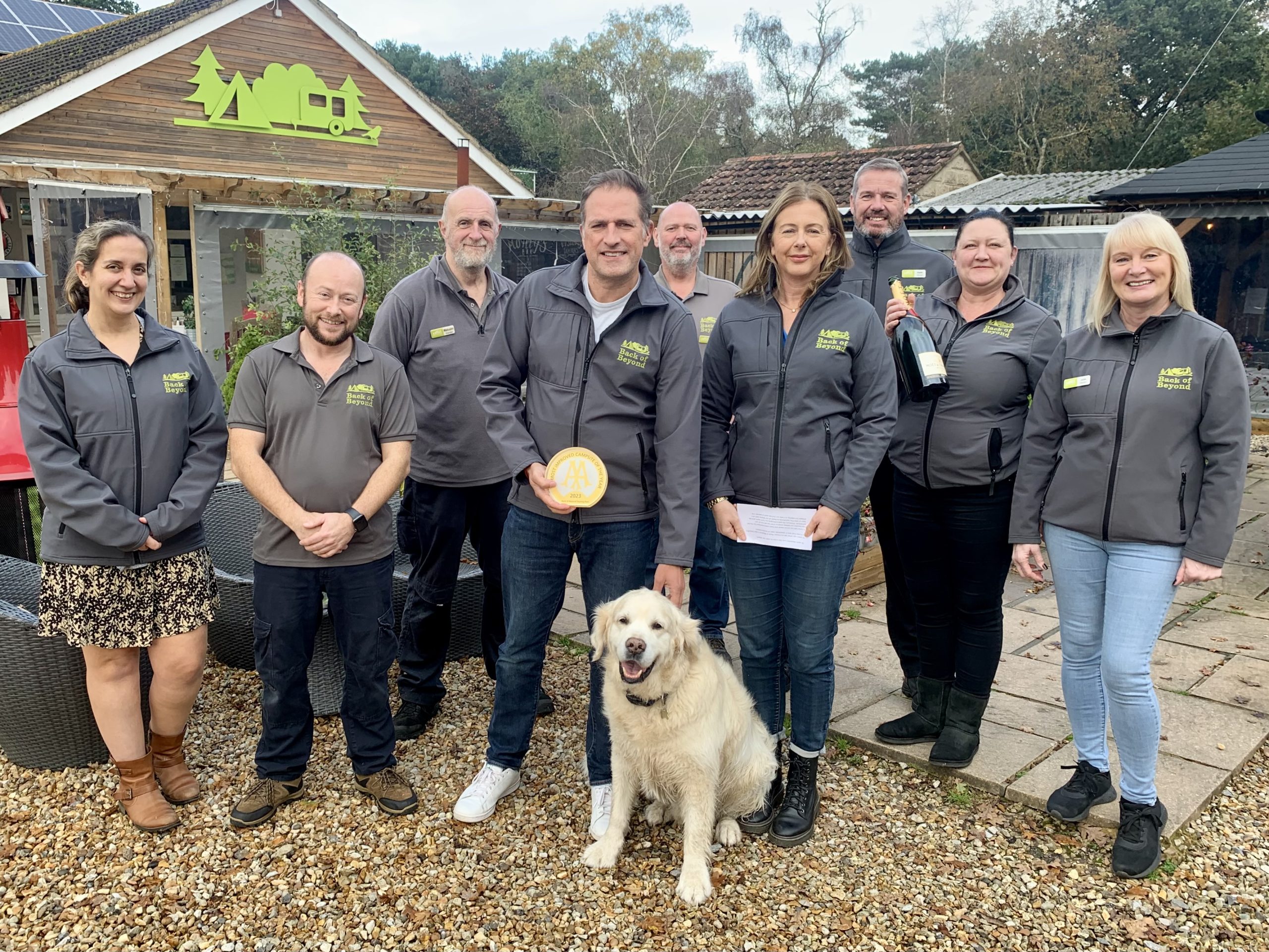 Some of the Back of Beyond Touring & Glamping Park team with the AA Most Improved Campsite of the Year 2023 award