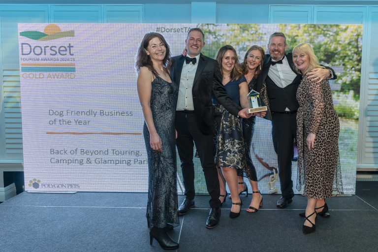 Back of Beyond team with their gold award
