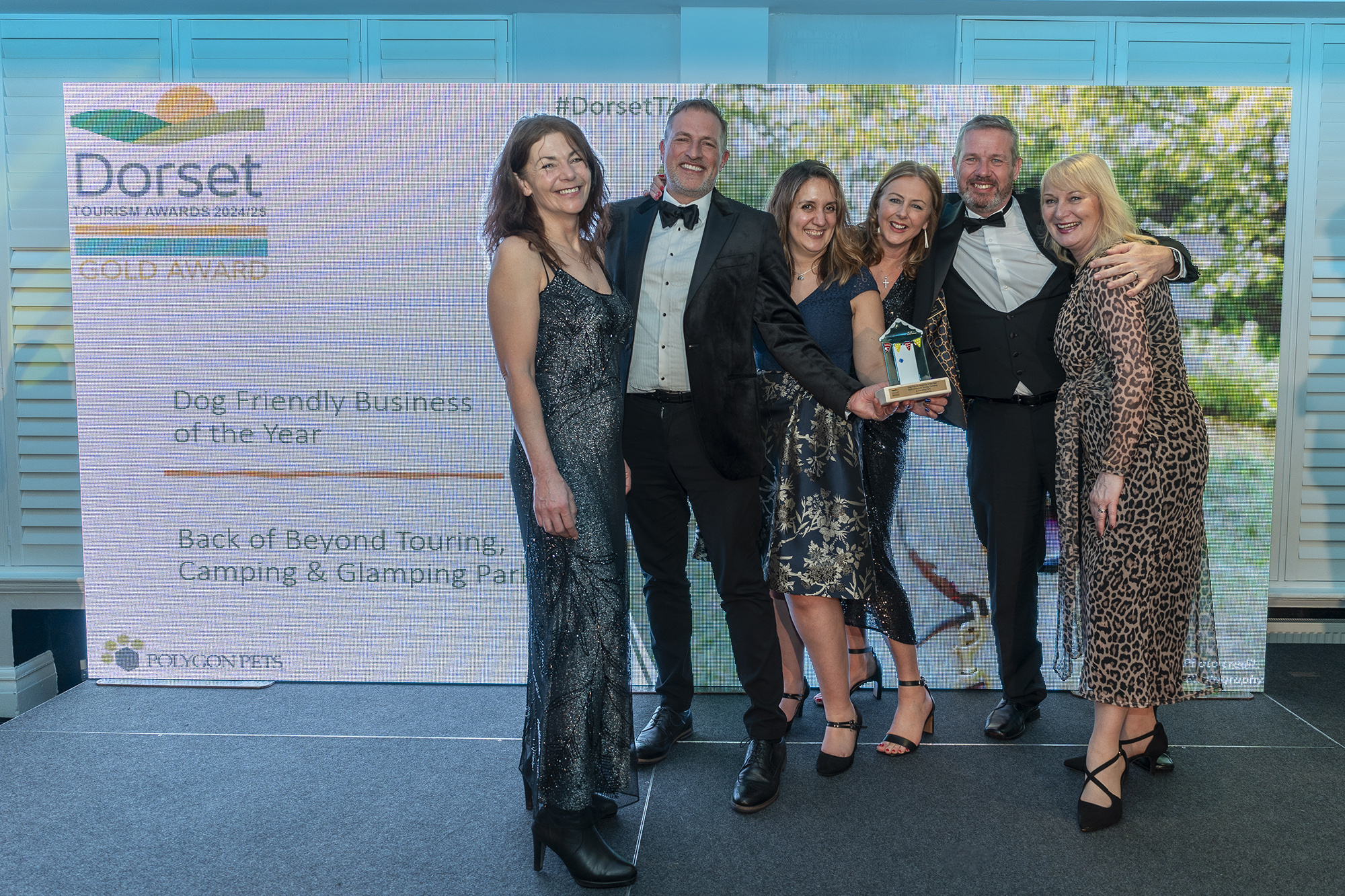 Back of Beyond team with their gold award
