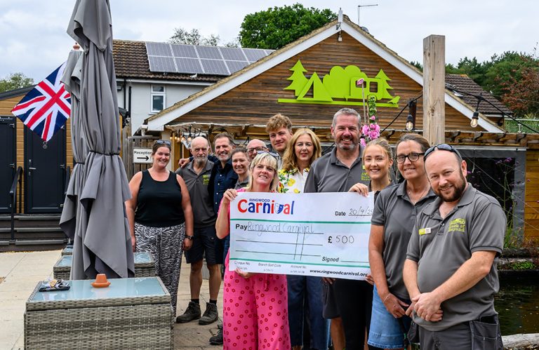Back of Beyond team present a cheque to the Ringwood Carnival