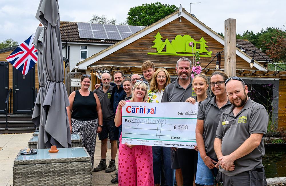 Back of Beyond team present a cheque to the Ringwood Carnival