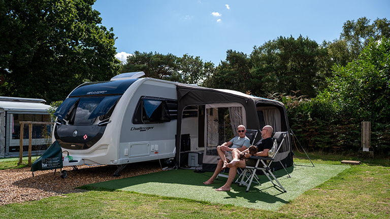 Couple with their caravan