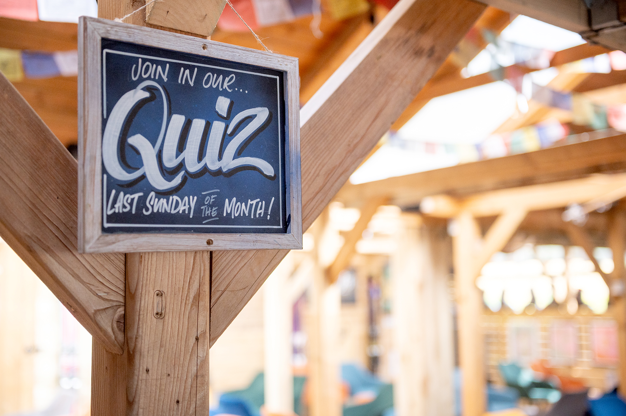 A chalk sign saying Quiz of the month on display at Monty's Bar